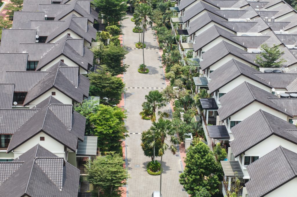 well-being suburban neighborhood, sunny summer day